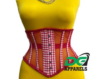 May include: A red, white, and orange corset with a gingham pattern and black buttons. The corset is displayed on a yellow mannequin, with a silver chain necklace. The logo "DG APPARELS" is visible.