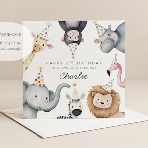May include: A square birthday greeting card featuring watercolor illustrations of a giraffe, monkey, hippo, elephant, zebra, lion, and flamingo, all wearing colorful polka-dot party hats. The text reads: HAPPY 2ND BIRTHDAY TO A SPECIAL LITTLE BOY Charlie.