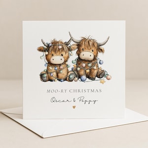 May include: A square greeting card featuring a watercolor illustration of two brown Highland cows tangled in colorful Christmas lights. The text reads MOO-RY CHRISTMAS and Oscar & Poppy with a small heart symbol below the names on a white background.