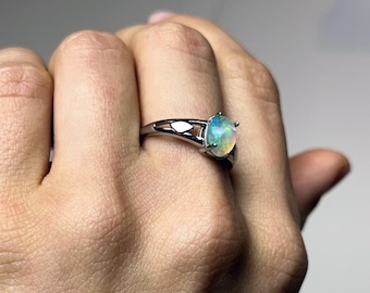Ethiopian Opal Sterling Silver Ring: Adjustable Oval Cut, Elegant Jewelry