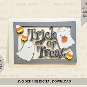 May include: A Halloween-themed layered paper art piece with the words "Trick or Treat" in a gray frame. The design includes two white ghosts, a bat, and candy corn accents. The text "SVG DXF PNG DIGITAL DOWNLOAD" is also present.
