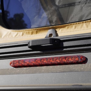 Super Pacific X1–Go Fast Camper—Lone Peak grab handle for T-tracks