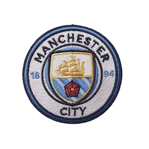 Fotbollsmärken Broderad strykmärke med Manchester City-logotypen. Den bästa presentidén för fotbollsfans.