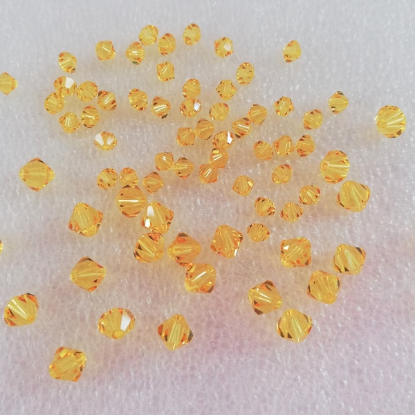 Light Topaz, Swarovski Crystal Bicone Beads(5301), 4mm or 6mm, Sold per pack.