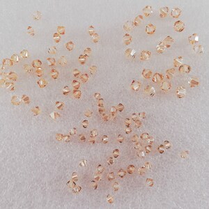 Crystal Golden Shadow, Swarovski Crystal Bicone Beads(5328), 4mm or 5mm or 6mm, Sold per pack.