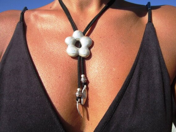 silver beaded necklace with flower pendant