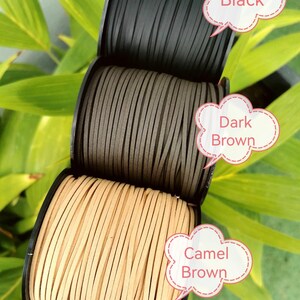 three spools of cord, each with a different color: black, dark brown, and camel brown. The spools are arranged in a row, with the black one at the top, the dark brown one in the middle, and the camel brown one at the bottom. Each spool is labeled with a speech bubble containing the name of the color, such as "Black", "Dark Brown", and "Camel Brown".