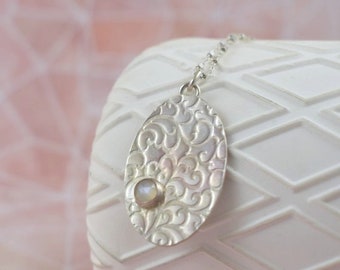 Oval medallion, moonstone necklace, metalwork romantic jewelry
