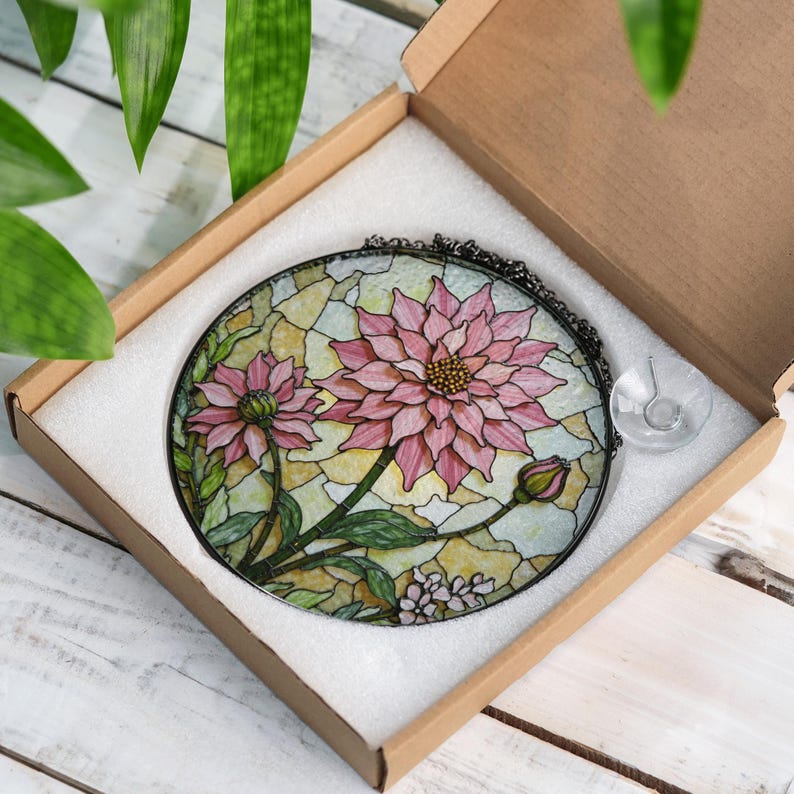 a box that has a picture of a flower inside of it