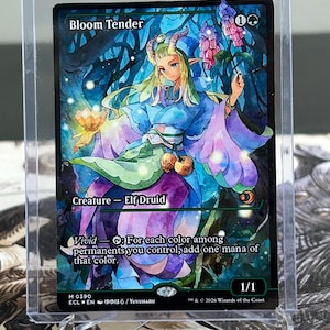 May include: A Bloom Tender trading card in a protective sleeve. The card features an illustration of an elf druid with a floral theme, in shades of blue, green, and purple. The text includes "Bloom Tender", "Creature - Elf Druid", and game instructions.