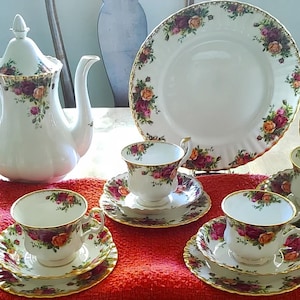 Beautiful Royal Albert Old Country Roses Dinnerware, Coffeepot, Cups, and Saucers. Made in England.