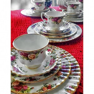Four Five-piece Place Settings of Beautiful Royal Albert Old Country Roses Pattern Bone China