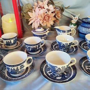 Blue Willow Pattern Tea Cups, Saucers, Creamer, and Sugar bowl From Johnson Brothers and Churchill. Made in England.