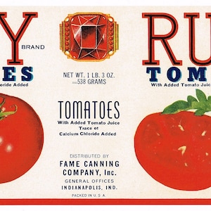 May include: A vintage label for Ruby brand canned tomatoes. The label features a red gemstone, a red and white illustration of tomatoes, and the text "Ruby Tomatoes" with the words "With Added Tomato Juice Trace of Calcium Chloride Added".