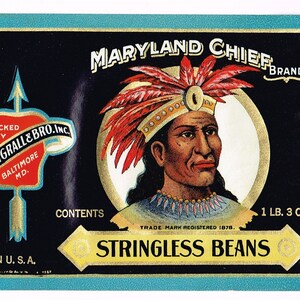 May include: A vintage label for Maryland Chief Brand Stringless Beans. The label features a bowl of green beans, a Native American chief, and the text "Maryland Chief Brand Stringless Beans" with the contents listed as "1 lb. 3 oz."