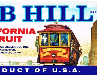 May include: A vintage illustration of a red cable car with the words "Nob Hill California Fruit" and "Product of U.S.A." on a blue background. The image also features a cityscape with tall buildings.