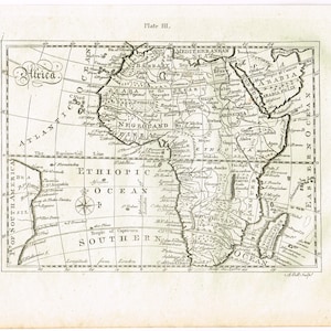May include: Antique map of Africa, featuring detailed geographical information. The map, labeled "Plate III," includes the Atlantic and Indian Oceans, with text such as "Negroland" and "Ethiopian Ocean." The map is printed on aged paper.