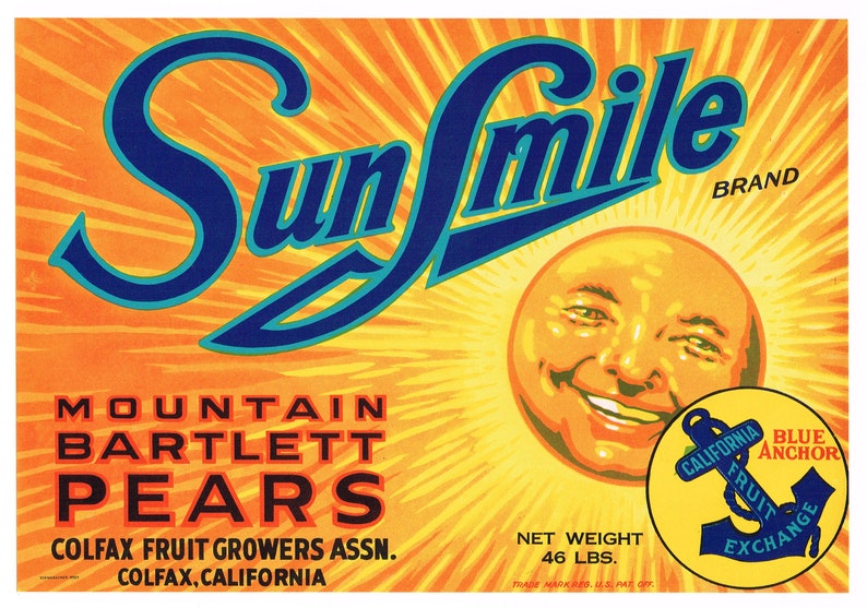 May include: A vintage label for Sun Smile brand Mountain Bartlett Pears, featuring a smiling sun face with a blue anchor logo and the text "California Fruit Exchange". The label is orange and yellow with blue text and a net weight of 46 lbs.