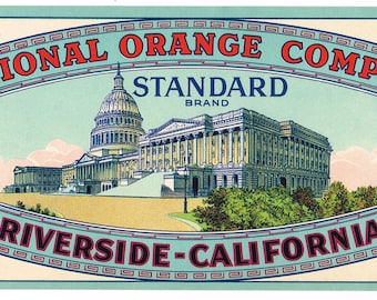 Peut inclure: Une étiquette ovale bleue et rouge avec le texte "National Orange Company. Standard Brand Riverside-California" et une représentation du Capitole des États-Unis.