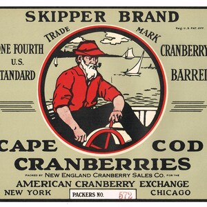 May include: A vintage label for Skipper Brand Cape Cod Cranberries. The label features a red and black circle with a cartoon illustration of a man in a red shirt and black pants steering a boat. The text "SKIPPER BRAND" is at the top of the label, and "CAPE COD CRANBERRIES" is at the bottom. The label also includes the text "ONE FOURTH U.S. STANDARD" and "PACKED BY NEW ENGLAND CRANBERRY SALES CO. FOR THE AMERICAN CRANBERRY EXCHANGE NEW YORK PACKERS NO. 572 CHICAGO".