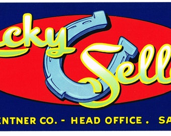 May include: A blue and yellow logo with the text "Lucky Seller" and a horseshoe graphic. The logo is on a red oval with a blue background. The text "PRODUCE OF U.S.A." is below the logo. The text "A. LEVY & J. ZENTNER CO. - HEAD OFFICE. SAN FRANCISCO" is below the text "PRODUCE OF U.S.A."