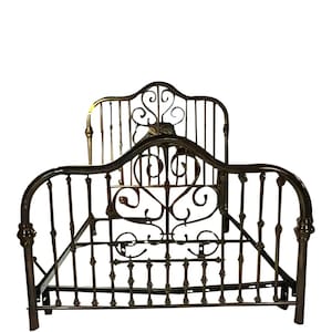 May include: A dark bronze metal bed frame featuring a headboard and footboard with vertical spindles and decorative scrollwork. The frame includes side rails and a central support structure, showcasing a curved top design on both ends.