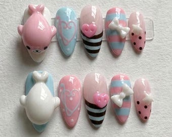Unghie finte a forma di foca pastello, unghie a forma di foca 3D con bottone a cuore e fiocco, unghie kawaii dolci e personalizzate.