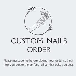 May include: A light gray graphic with the text "CUSTOM NAILS ORDER". The image includes a circular design with a hand holding a butterfly. The text below says "Please message me before placing your order so I can help you create the perfect nail set that suits you best."