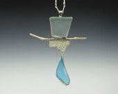 Sky blue beach glass pendant recycled glass sterling silver necklace bezel set sea glass and roller printed metal lost wax cast silver twig
