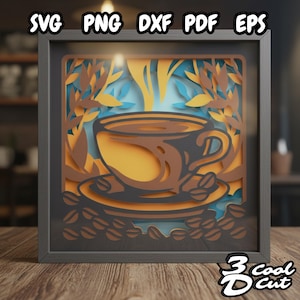Könnte beinhalten: Ein mehrschichtiges Papierkunstwerk in einem dunkelgrauen Rahmen. Das Kunstwerk zeigt eine braune Kaffeetasse mit Dampf, Kaffeebohnen und Blättern in Braun-, Orange- und Blautönen. Oben steht der Text "SVG PNG DXF PDF EPS".