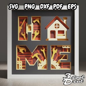 May include: A framed paper art piece spelling "HOME", featuring a house and tools. The letters are filled with yellow wrenches, hammers, and other tools, set against a red and orange background. The artwork is framed in a white shadow box.