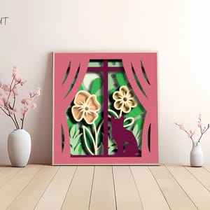 Layered 3D papercut shadow box showing a cute cat gazing through a spring window surrounded by flowers, leaves, and seasonal nature elements. Designed for Cricut, Silhouette, and other cutting machines, this DIY papercraft design is ideal for cat lovers, spring decorations, or handmade seasonal gifts. Beautifully detailed and easy to assemble, perfect for adding a warm spring vibe to any room.