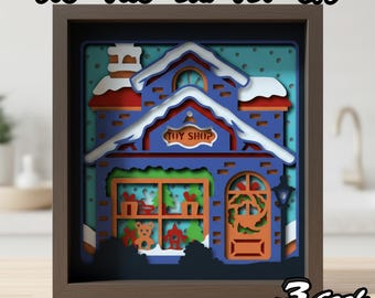 Christmas Toy Shop 3D Shadow Box SVG, Layered Papercut Winter Scene Light Box for Cricut and Silhouette, 3D Holiday SVG DIY Craft