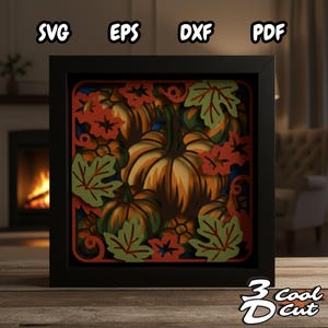 Puede incluir: Una obra de arte en papel en capas en un marco negro, con calabazas y hojas de otoño en tonos naranja, verde y rojo. La obra de arte incluye el texto "SVG EPS DXF PDF" y "3 Cool Cut".