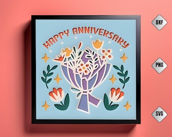 May include: A layered paper art piece with a light blue background and a black frame. The artwork features a bouquet of flowers in shades of purple, white, and orange, with the words "HAPPY ANNIVERSARY" in orange. Decorative stars and leaves surround the bouquet.