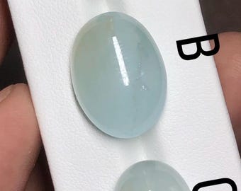 Naturlig mjölkig akvamarin cabochon – mjuk blå polerad ädelsten