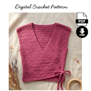 May include: A magenta-colored, sleeveless crochet wrap top with a V-neck design and tie closure. The top is handmade with a textured stitch pattern. The image includes the text "Digital Crochet Pattern" at the top, along with a PDF icon and a download symbol.