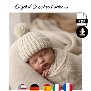 May include: A sleeping baby wearing a cream-colored, ribbed knit hat with a pom-pom. The baby is wrapped in a matching knit blanket. The image includes the text "Digital Crochet Pattern" and a PDF download icon.
