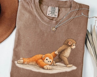 Comfort Colors® Monkey Punch Graphic TShirt, Baby Monkey Holding Plush Toy Long Sleeve Tee, Animal Lover Gift, Cute Cozy Shirt