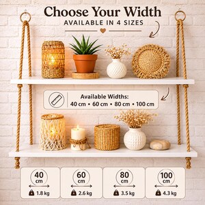 May include: A two-tier white wooden hanging shelf suspended by thick tan ropes. The shelves display decorative items including a succulent, candles, woven baskets, and vases. Text indicates available widths of 40 cm, 60 cm, 80 cm, and 100 cm.