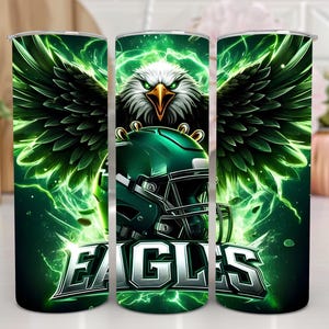 May include: Three green and black stainless steel tumblers with a green and black eagle graphic and the word "EAGLES" in silver lettering.