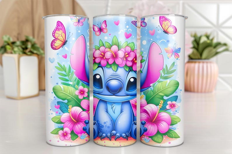 May include: Three white insulated tumblers featuring a blue cartoon character with large ears, wearing a flower crown. The design includes pink hibiscus flowers, butterflies, and hearts on a light blue background. The tumblers are decorated with a tropical theme.