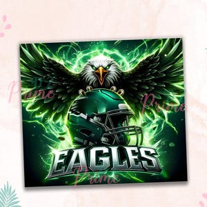 May include: A green and black eagle with its wings spread wide, holding a green and black football helmet. The helmet has a white face mask and the word "EAGLES" is written in white letters on a green background.