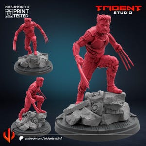 May include: Red 3D-printed Wolverine figure with claws extended, posed on a grey rocky base. Two smaller figures are in the background. The Trident Studio logo is visible. The figure is a collectible.