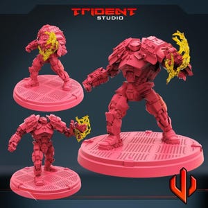 May include: Three red robot figurines with yellow energy effects, each standing on a circular base. The Trident Studio logo is at the top. The robots have detailed mechanical designs, with one in the centre and two smaller ones on the sides.
