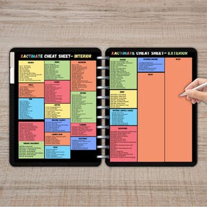 May include: Open notebook with the text "XACTIMATE CHEAT SHEET - INTERIOR" and "XACTIMATE CHEAT SHEET - EXTERIOR". The pages are divided into colourful sections with lists of terms. A hand holds a pen over the right page.