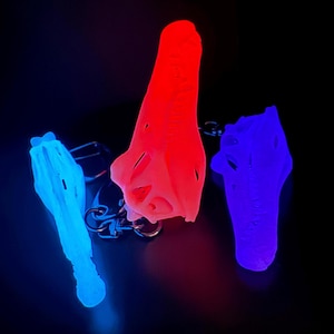 Spinosaurus / Brilla en la oscuridad / Llavero de resina con réplica de calavera / Huesos brillantes