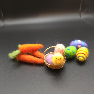 Hand felted eggs, carrots and a tiny chick