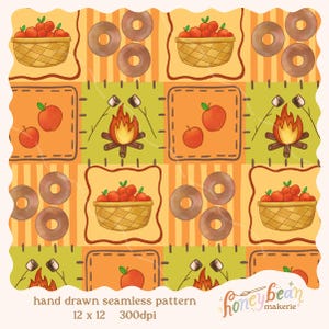 May include: A seamless digital pattern featuring hand-drawn illustrations of apple baskets, brown donuts, campfires with marshmallows on sticks, and red apples. The design uses a grid of orange, yellow, and green squares with text reading honeybean makerie.