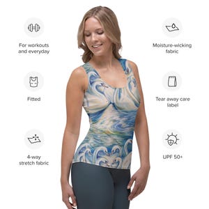May include: A white tank top with a colorful print of swans on a lake. The tank top is fitted and has a 4-way stretch fabric. It is moisture-wicking and has a tear-away care label. The tank top also has UPF 50+ sun protection.